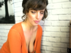 Busty curly brunette with big boobs fucks on couch