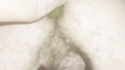 Freaky guy is stretching his butthole with a bottle and cucumber