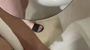 Filming the guy peeing next to me at the urinal of the pool toilets