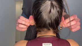 A PULL ON THE EARS BEHIND