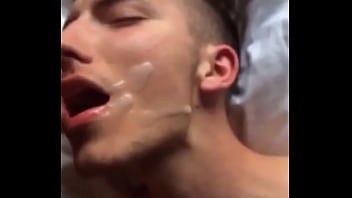 Twink eating cum.