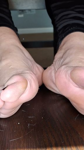 Playing with my girlfriends' feet under the table and removing her socks   Clip 2