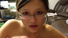 Foureyed Asian babe sucking my big dick in POV