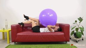 Petra blows up giant purple balloon (MOBILE)