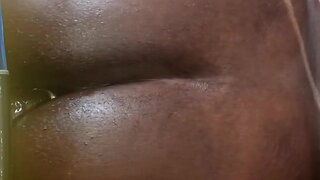 Midget masturbates lying on the floor and ejaculates weakly