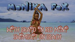 hot monika fox with braid in red mini swimsuit on beach