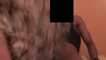 Horny, black dude is fucking a Caucasian woman in a doggy- style position, on web cam