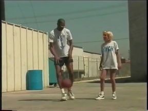 Blonde whore sucks and fucks huge black cock on a rooftop