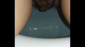 redhead pissed in the toilet