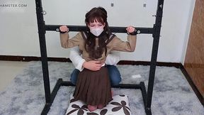 Teen babe bound in metal and ropes, silk feet tickle his cock