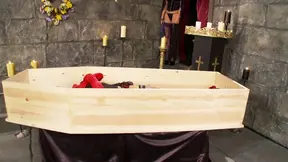 Vampire babes suck and lick each other's wet fuck holes in a coffin