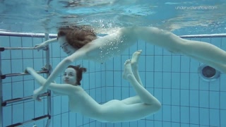 Two dressed beauties underwater Anna Netrebko and Lada Poleshuk