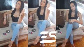 Smoking and my feet in denim jeans