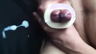 Two amateur guys share a fleshlight and cum together
