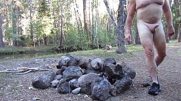 Naked at the fire pit and creek.