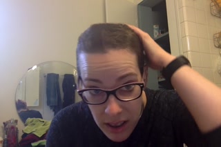 Shaved head fetish girl shaves her own head