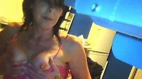 German webcam mommy brags off her long tongue and tits