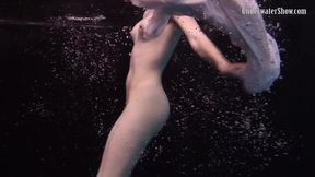 Dark ambiance with a white dress seducer