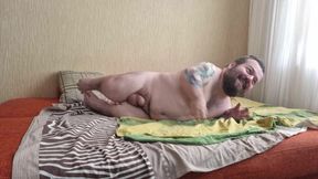 Midget jerks off on bed and then cums!