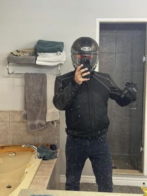 Man in helmet taking selfie