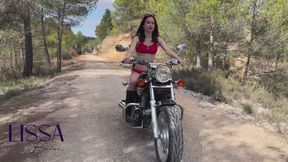Having fun with the vibrations of my motorcycle with belly button licking