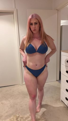 Blonde woman in blue bikini