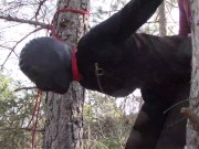 Tied up to a tree outdoor on sexy clothes, wearing pantyhose and high ankle boots heels, rough fuck