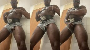 vibrating sex toy edging in leather and denim shorts