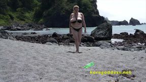 Big tits woman at the beach masturbates