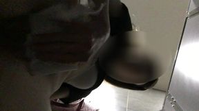 Piss from a hairy cunt in a public toilet