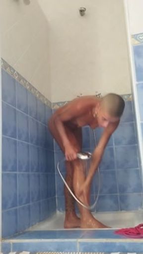 Taking a shower and masturbating with water pressure. Cum two times.