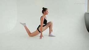 Russian gymnast Alla Sinichka takes off clothes and shows pussy in flexible positions