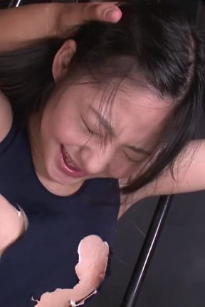 Tied up Japanese babe moans while her pussy is stuffed
