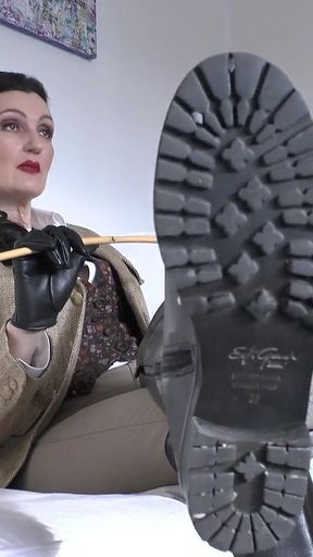 Licking Boot Soles Before the Cane Dances! Lady Victoria Valente