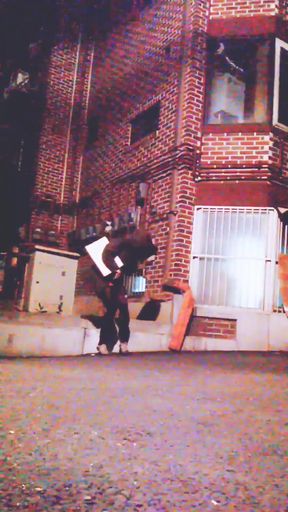 Hot slutty college girl shows her vib remote controller while many people passing by on public street, with vibrator on   Clip 1