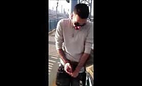 latino cums outside on the bridge