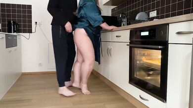 Horny mother-in-law and son-in-law masturbate together in the kitchen