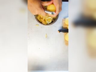 Peeling 'em Potatoe and greasing BACoN