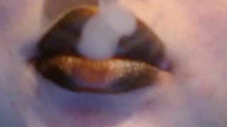 EXTREME smoking with black and orange lipstick