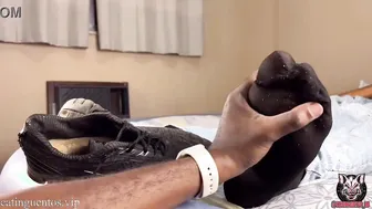 Solo guy shows off his huge smelly feet