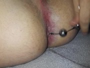 Caged slut stuffing anal beads in her ass
