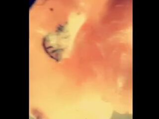 big beautiful woman large bazookas lathered up with soap in the shower