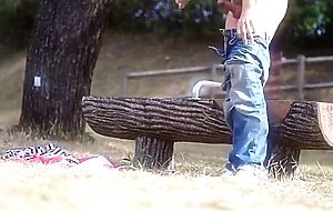 A young gay having a good wank in public