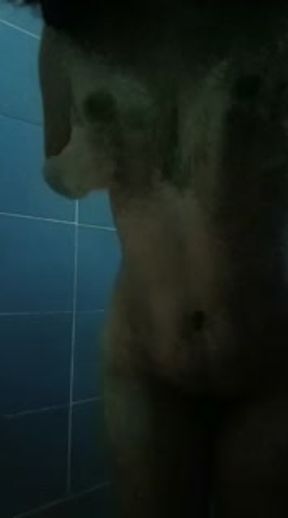Beautiful Latina masturbates in the bathtub.