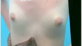 Sporty and adorable doll is taking off her bikini in the l