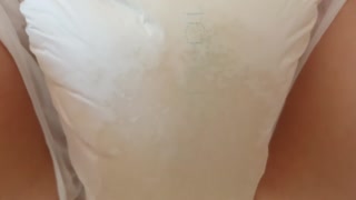 Naughty Maid Soaks her Diaper