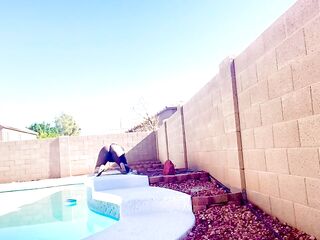 By the pool expecting