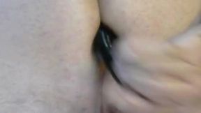 feeding an extra large anal bead wand deep into my tight ass