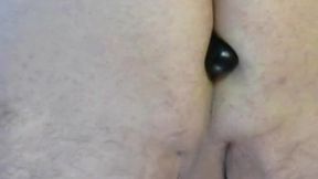 feeding an extra large anal bead wand deep into my tight ass