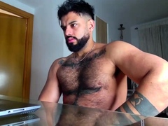 Gay latin stud jerks off his cock until he cums